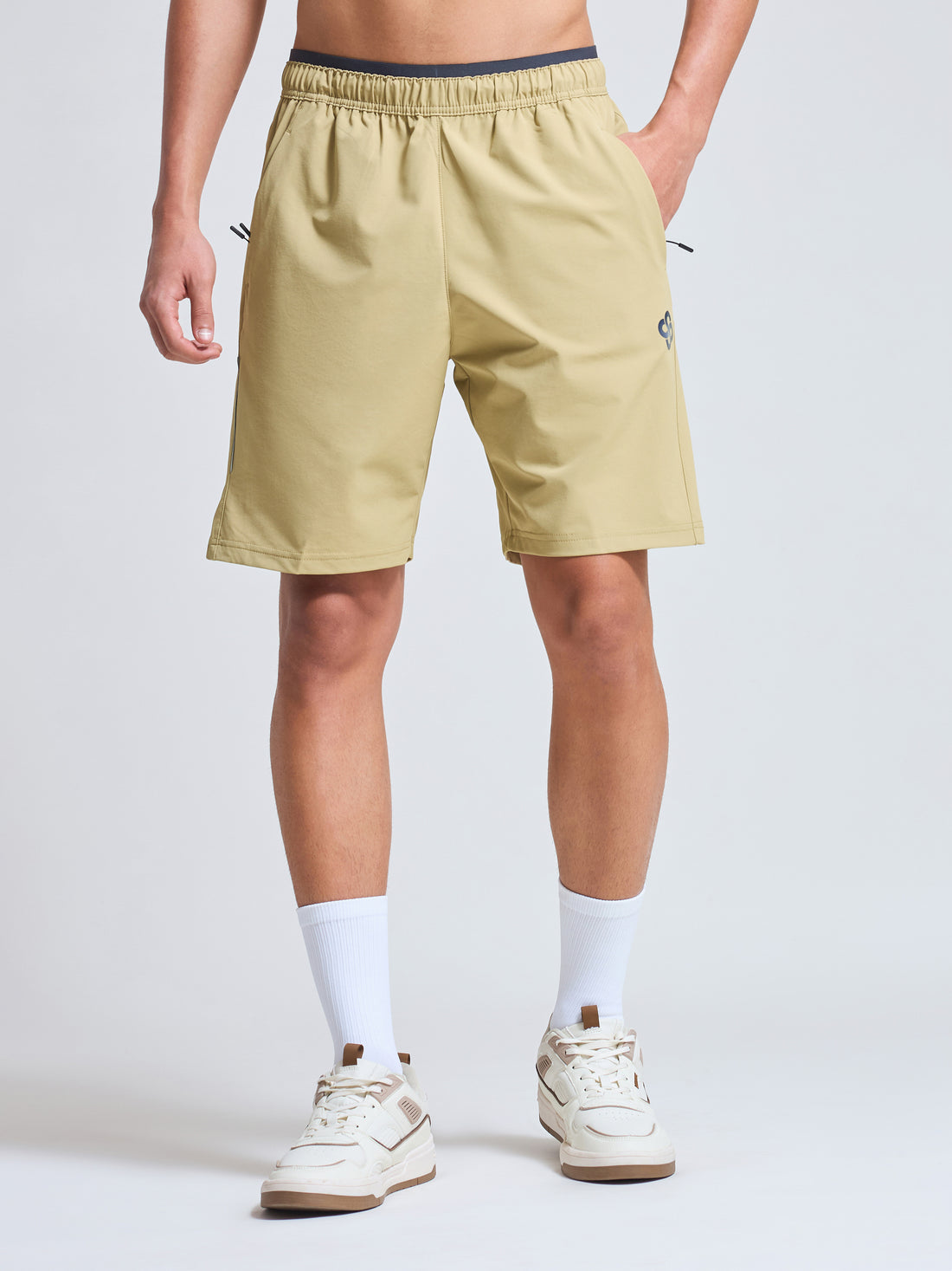 Infinito’s AquaShield Quick-Drying Shorts featuring breathable fabric, water-repellent finish, and a flexible fit for active lifestyles